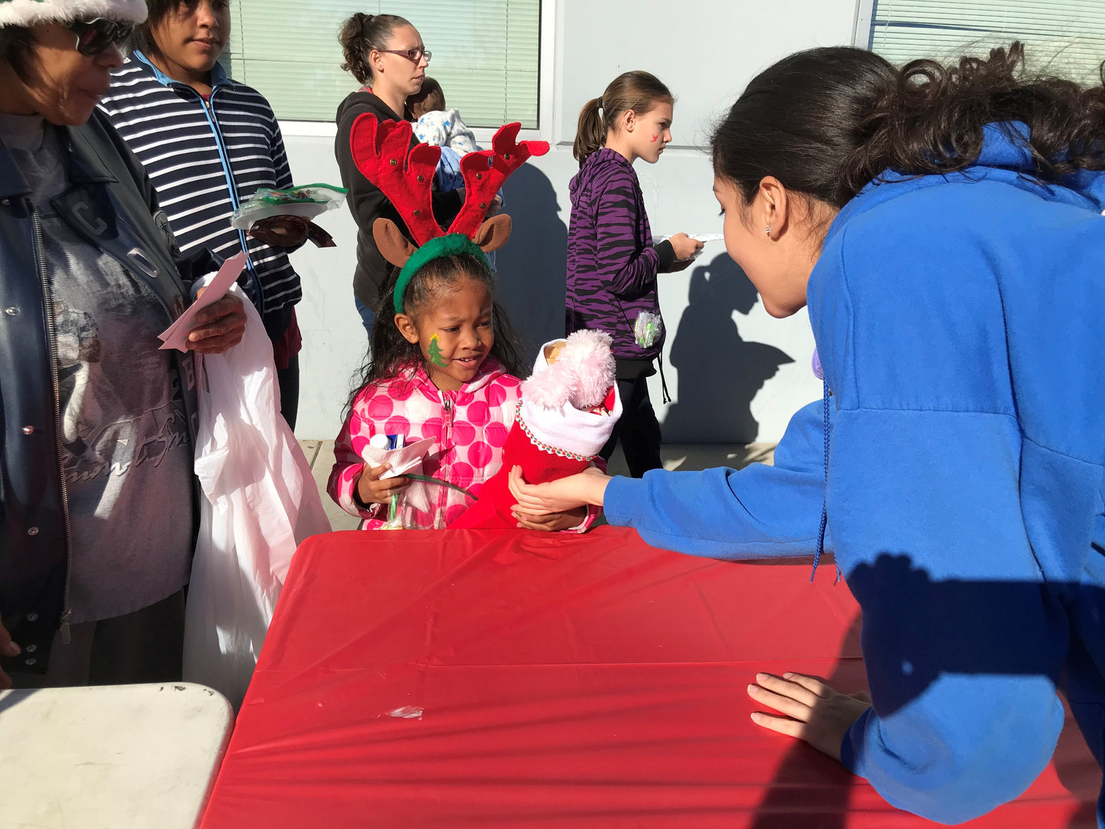 1,700 Stockings Filled with Gifts Distributed to Children in Need